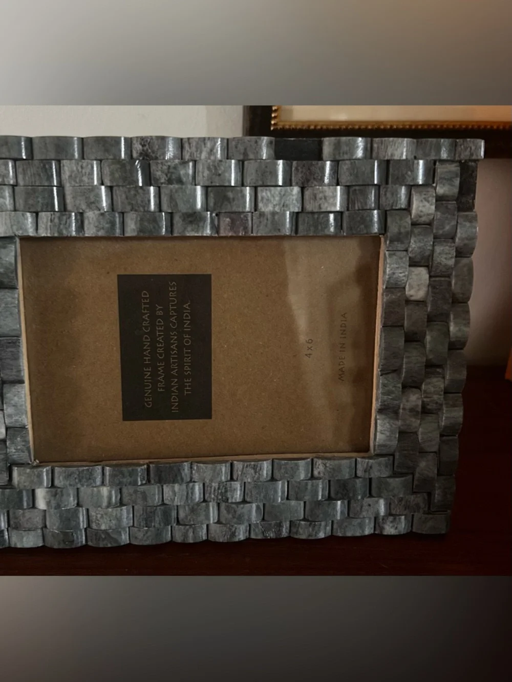 Two textured inlay picture frames, can stand horizontal or vertical.